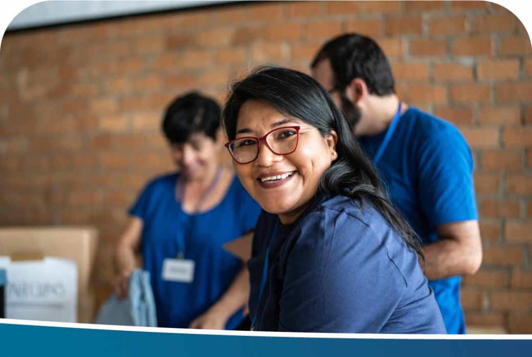 A portrait of a volunteer working in a community charity.