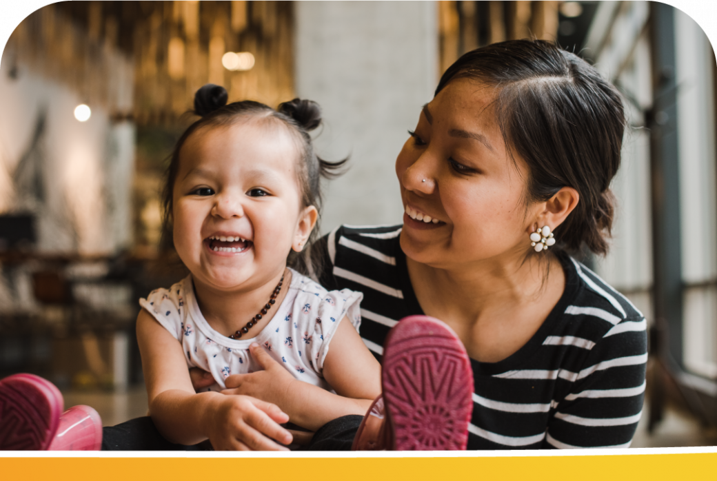 A portrait of a child with her mother.