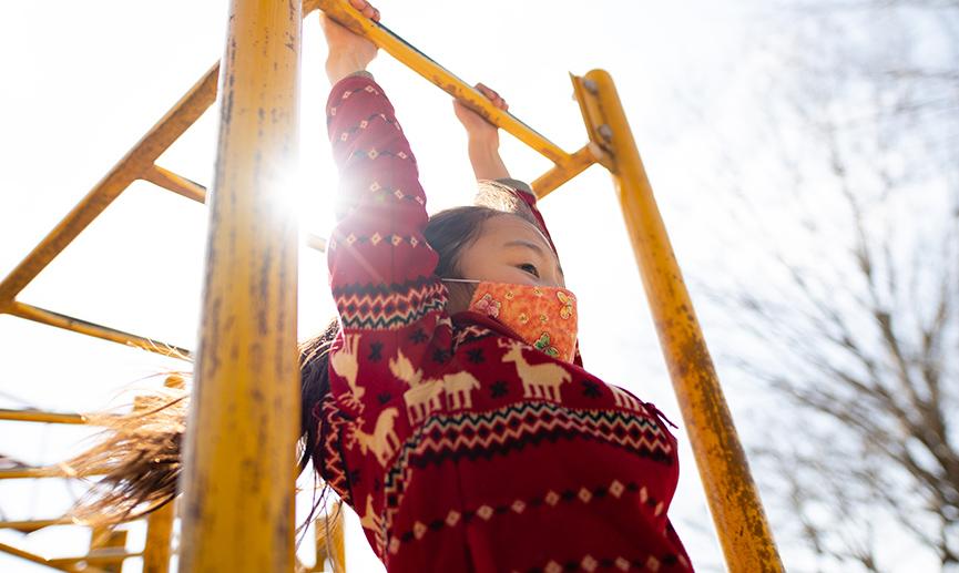 Girl playing in a playground