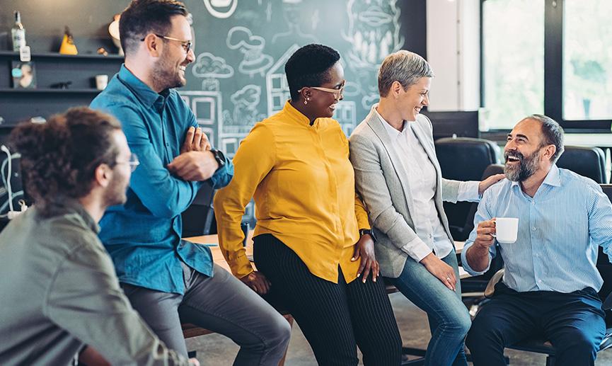 Group of business people talking in an office